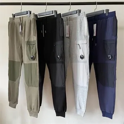 Cargo joggers hanging in olive, black, grey and navy